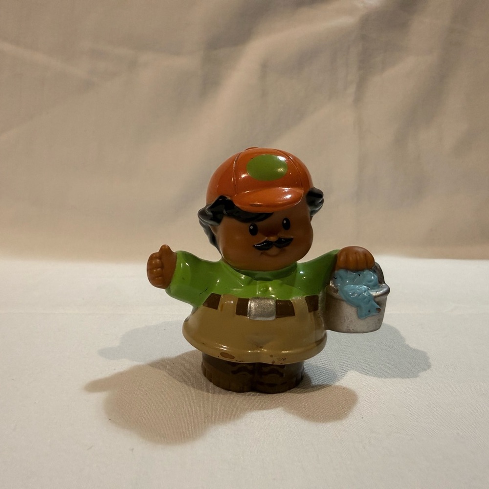 Fisher-Price Figure with Orange Hat and Green Shirt